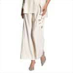 Beige Palazzo Pants with Handmade Flower Appliqué – Chic Resort Wear Trousers
